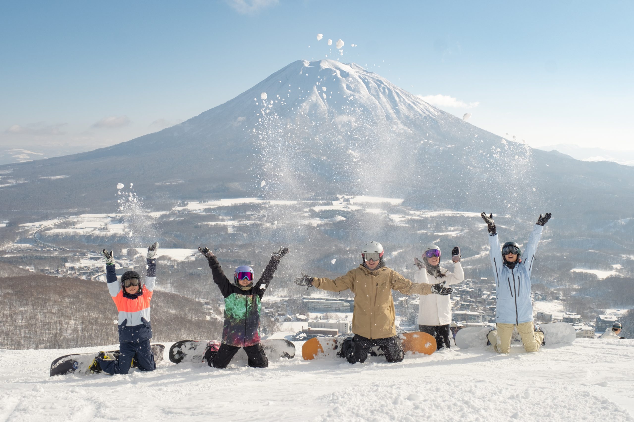 Family enjoying private Niseko winter journey in Hirafu, Hokkaido