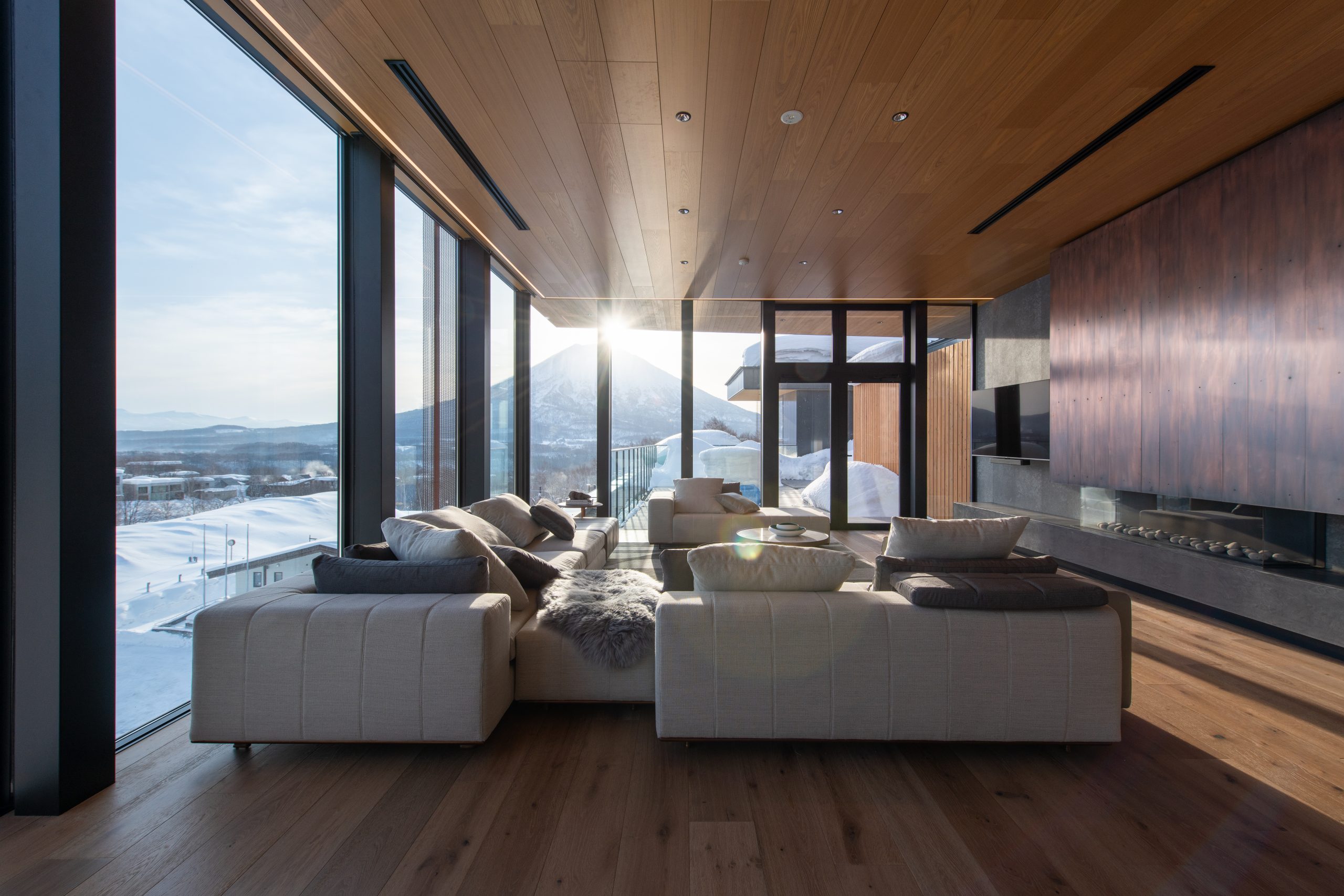 Five-bedroom penthouse residence interior in Niseko with floor-to-ceiling mountain views