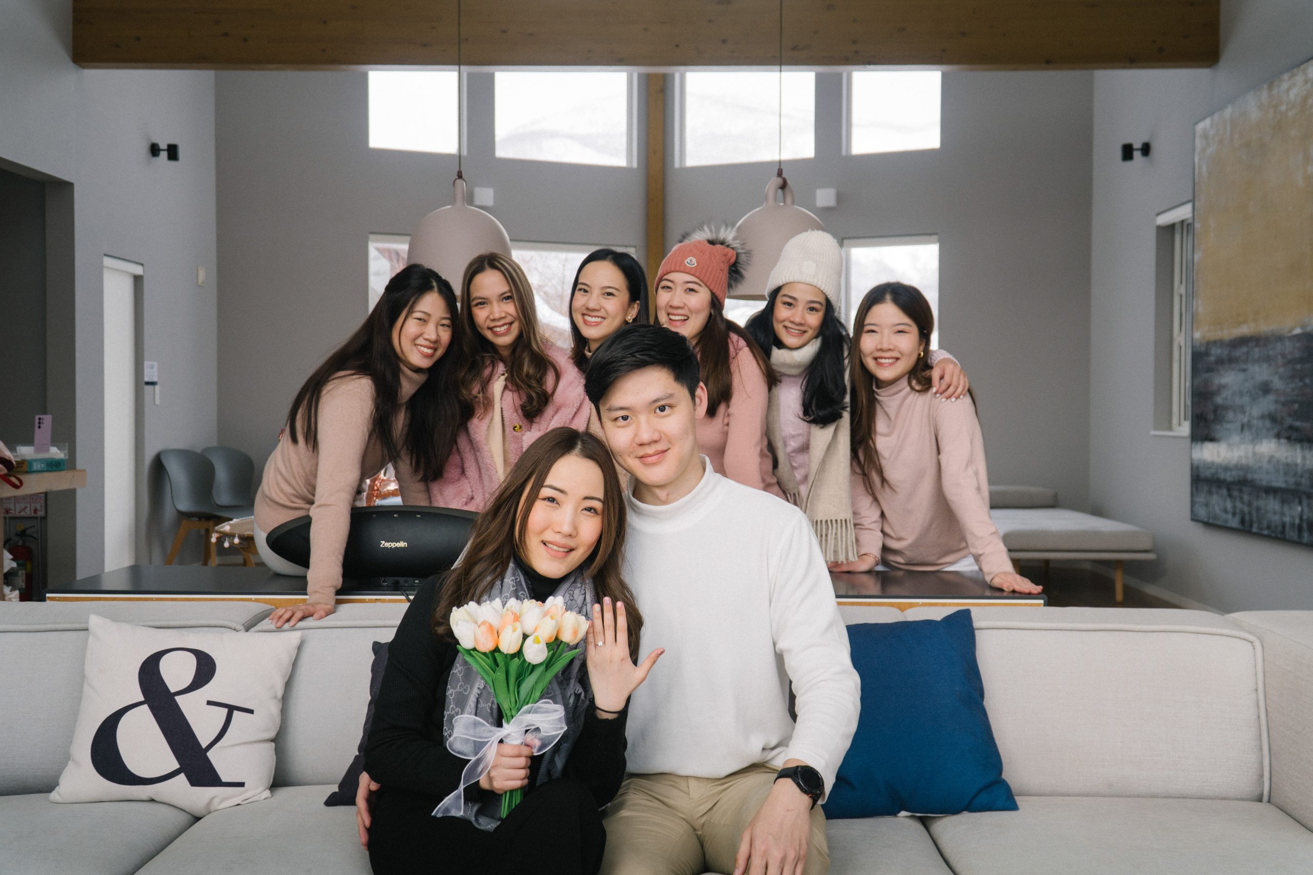 Newly engaged couple celebrating with friends